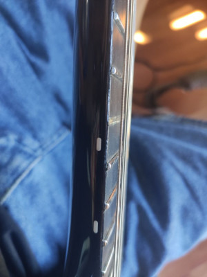 Here's the missing fret. The one below also looks like it's been messed with