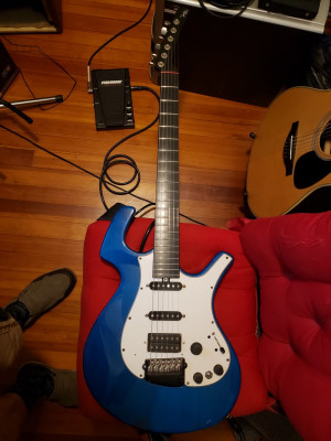Re-incarnated guitar. Brought back from being the body and neck with plastic bags full of the almost completely separated electronic components.
